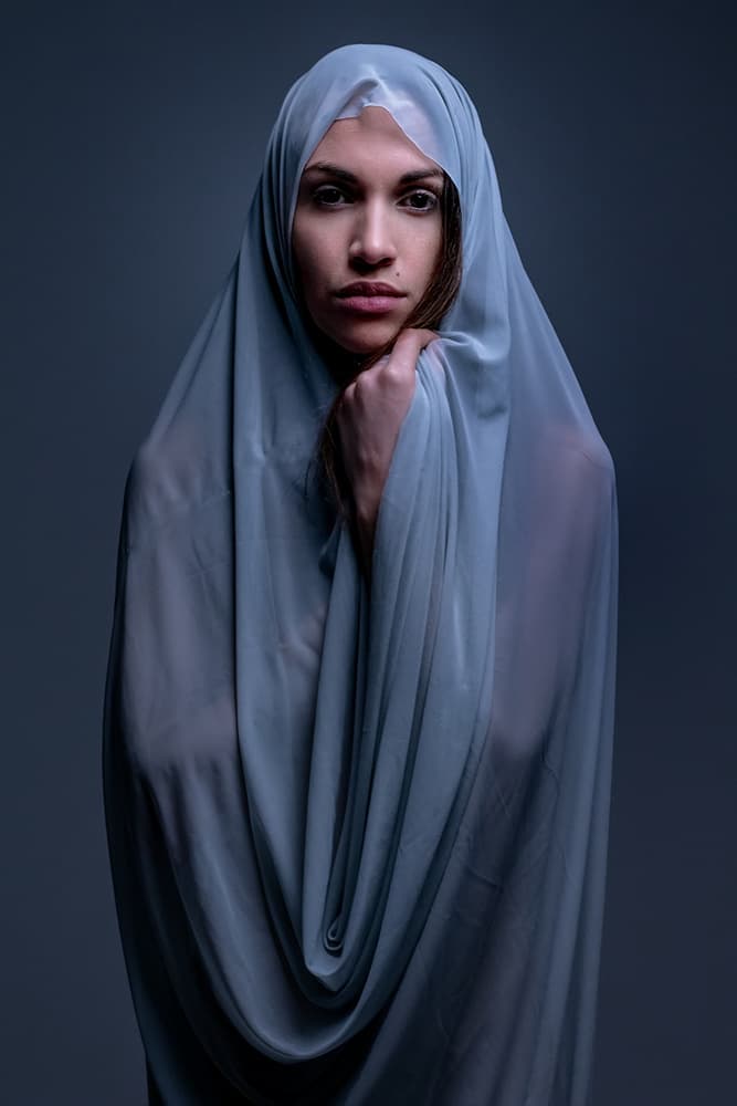 Contemplative Veiled Woman by Joan Gil Raga — canvas wall art