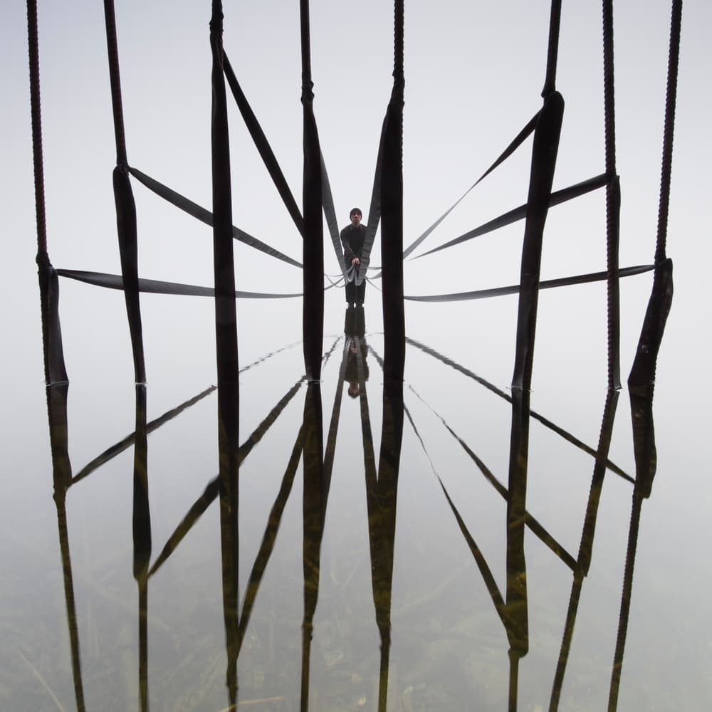 Solitary Figure Reflection by Leszek Paradowski — canvas wall art
