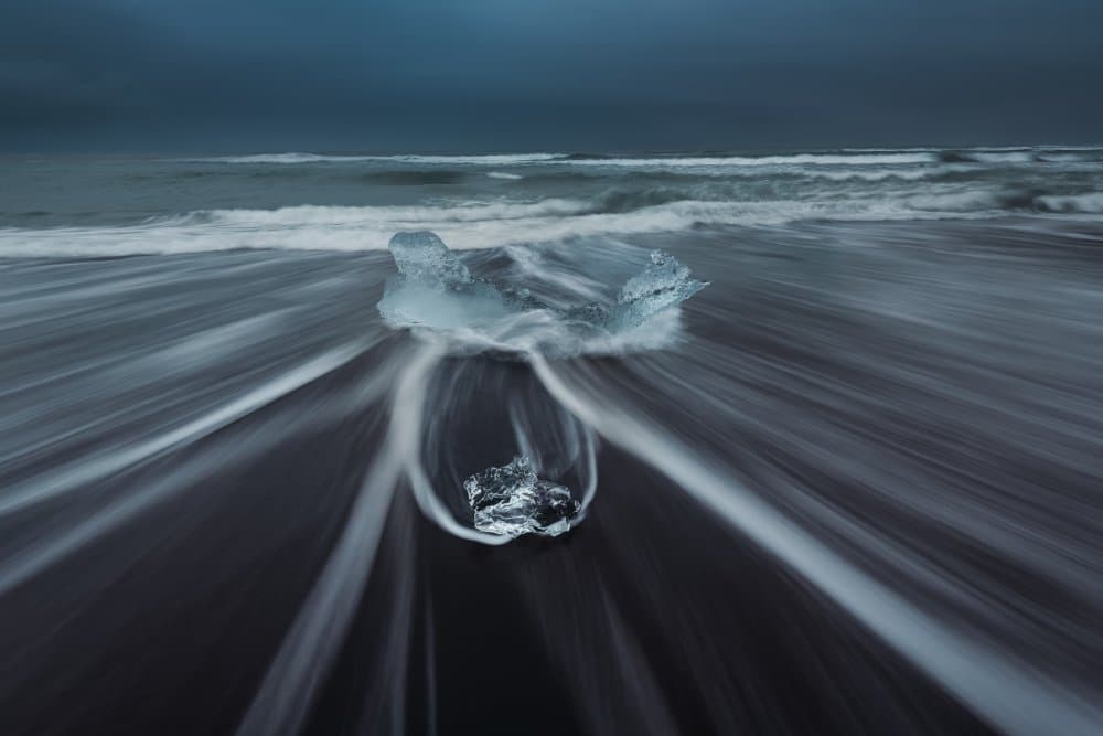 Dark Beach Ice Flow by Sunny Ding — canvas wall art