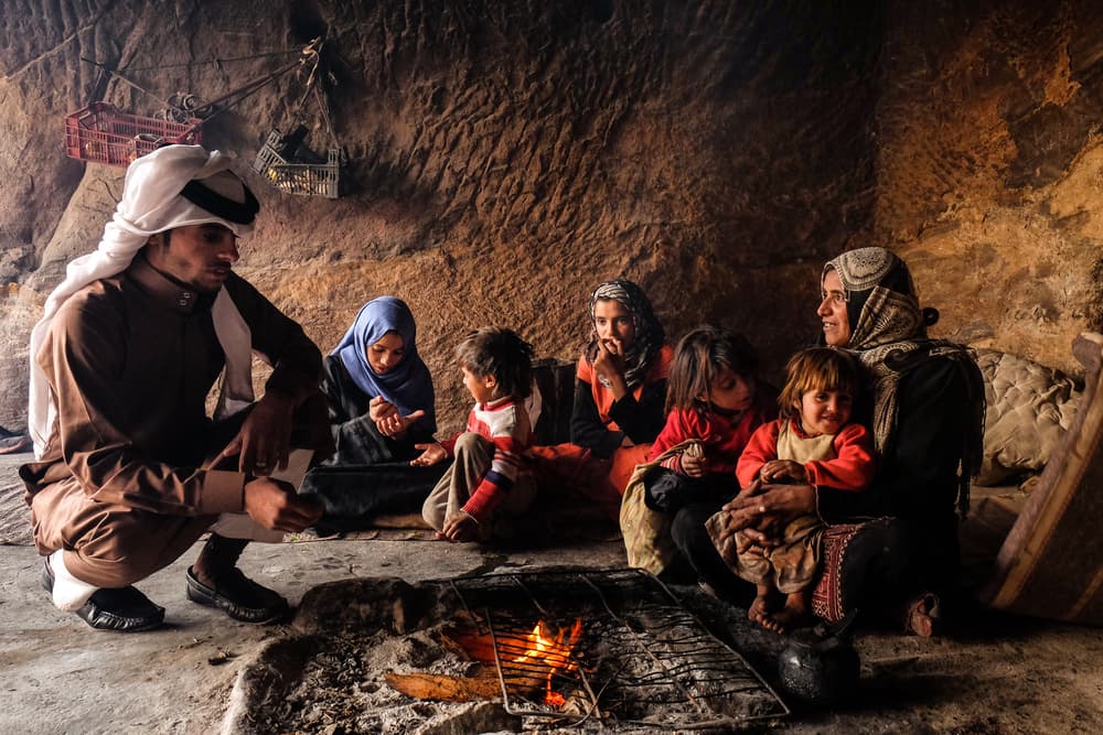 Warm Cave Family Gathering by Andrei Nicolas - The Traveler — canvas wall art