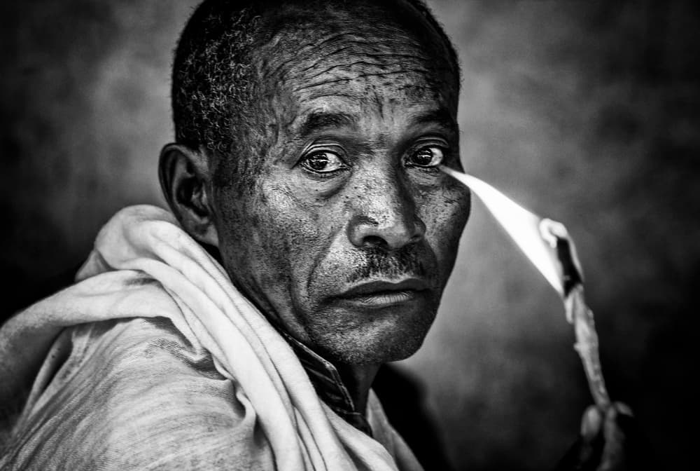 Thoughtful Gaze Candlelight by Joxe Inazio Kuesta Garmendia — canvas wall art