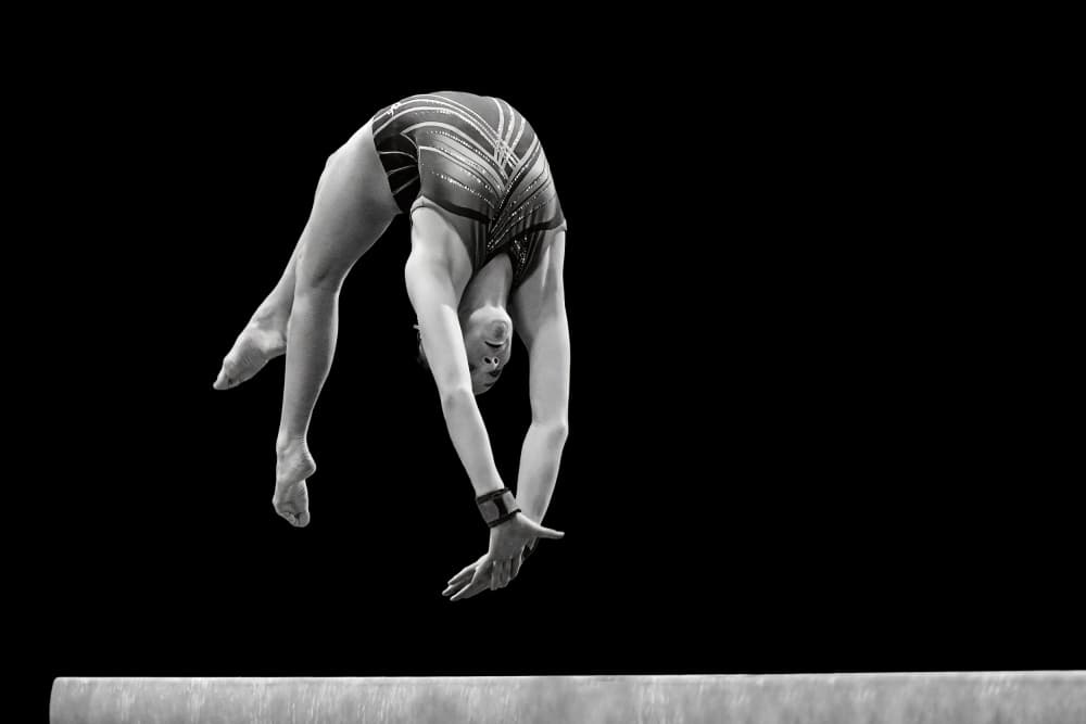 Gymnast On Beam by Rob Li — canvas wall art