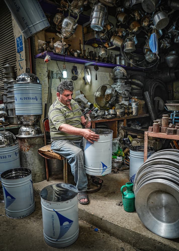 Artisan At Work by Bashar Alsofey — canvas wall art