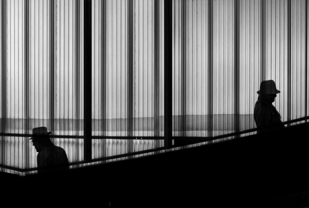 Silhouettes on Stairs by Ekkachai Khemkum — canvas wall art