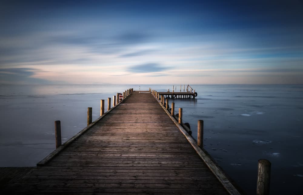 Frozen Lake Pier by Hans Günther — canvas wall art