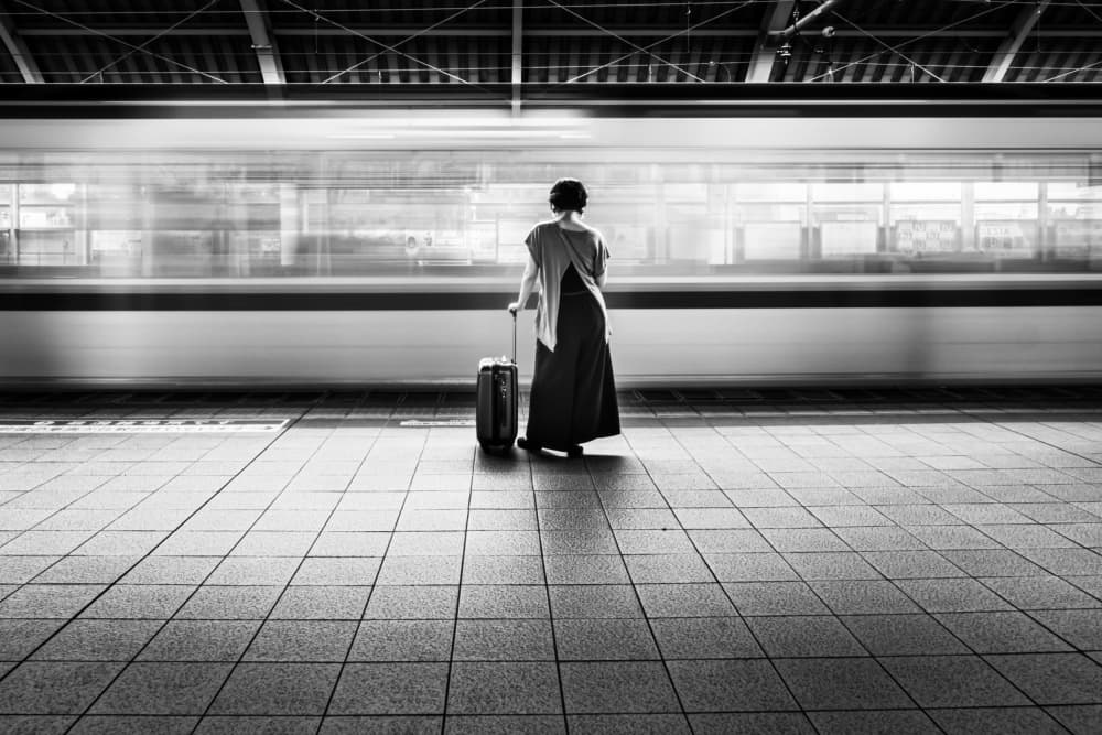 Woman Awaiting Train by IKUMI FUKAZAWA — canvas wall art