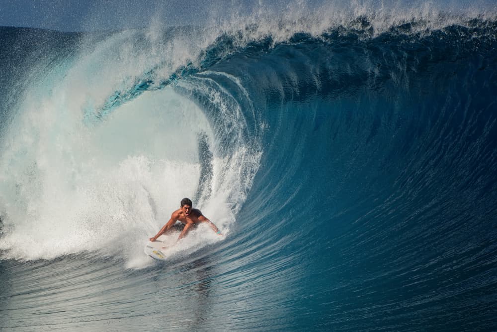 Surfer In Barrel Wave by Mathilde Guillemot — canvas wall art