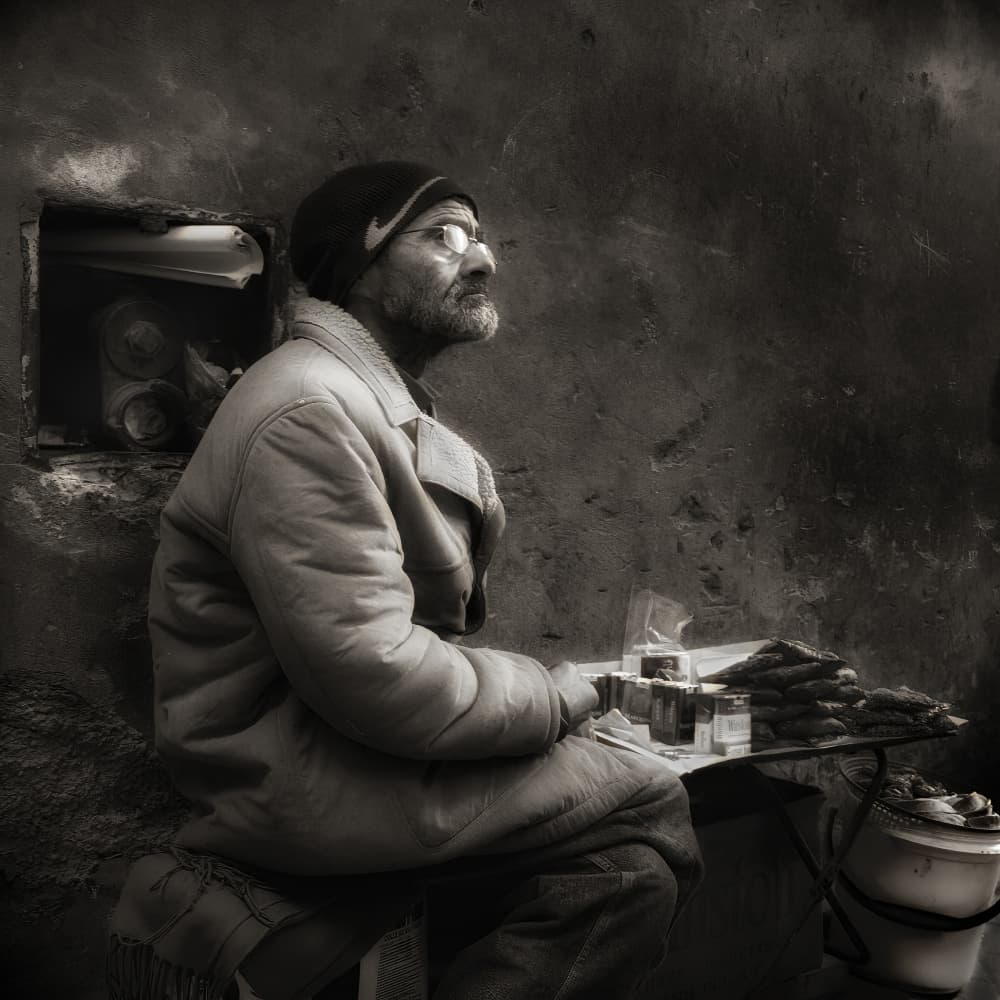 Pensive Street Vendor by Jan Donckers — canvas wall art