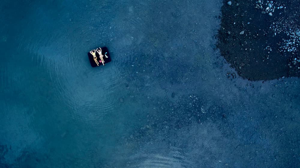 Floating on Blue Water by Luís Godinho — canvas wall art