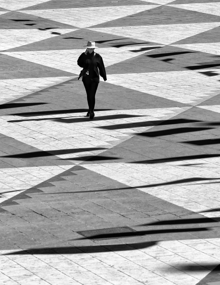 Lone Figure Geometric Shadows by Karim Al Thahaby — canvas wall art
