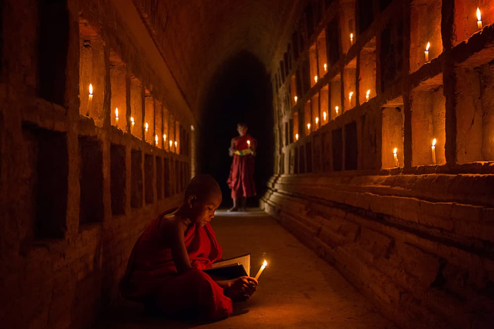 Monk Reading By Candlelight by Amnon Eichelberg — canvas wall art