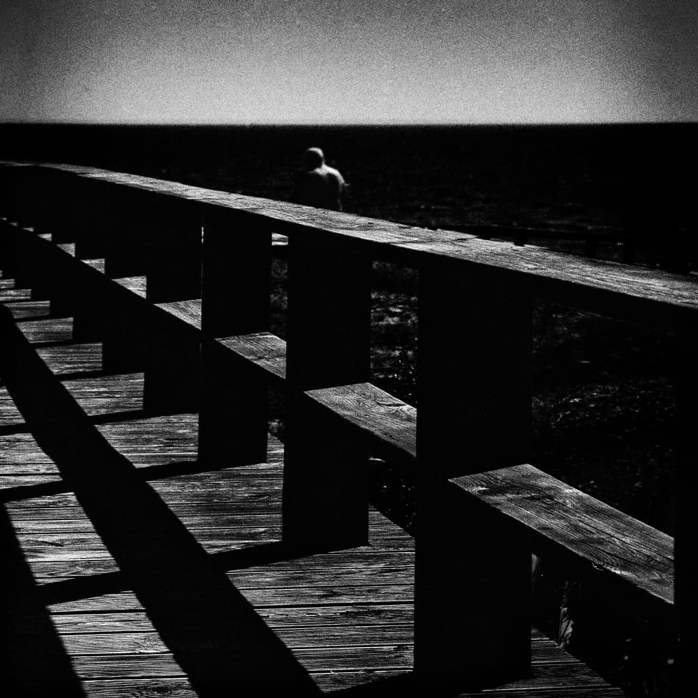 Solitary Figure Boardwalk by Paulo Abrantes — canvas wall art