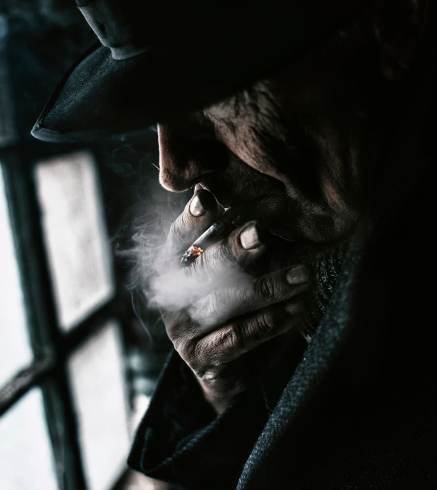 Contemplative Smoker in Shadow by Koki Jovanovic — canvas wall art
