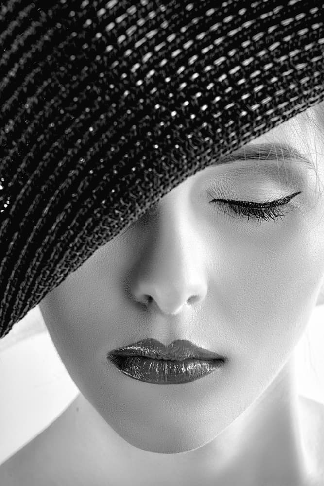 Elegant Black Hat Portrait by Ruslan Bolgov — canvas wall art