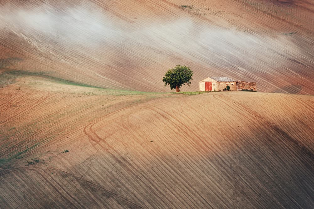 Rolling Hills Farmhouse by Aglioni Simone — canvas wall art