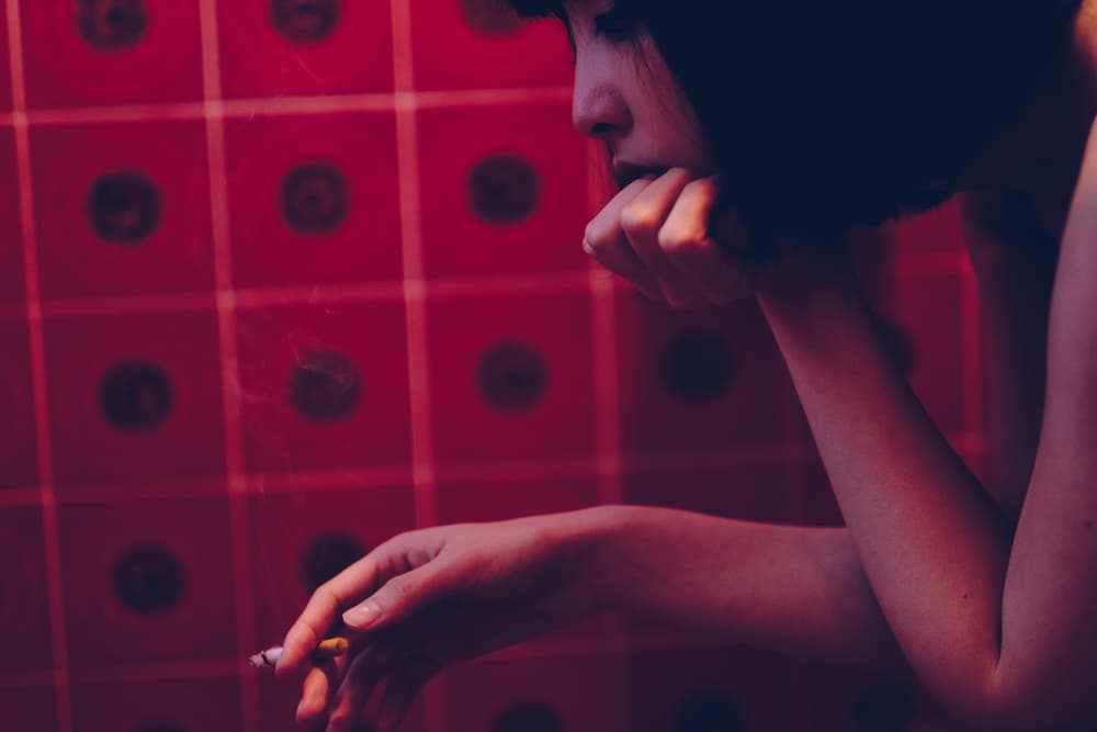 Pensive Woman Smoking by Takaaki Ishikura — canvas wall art