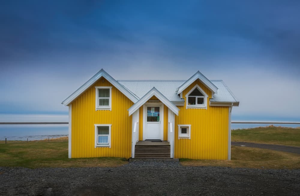 Yellow House by Calm Water by Eugenio Pastor Benjumeda — canvas wall art