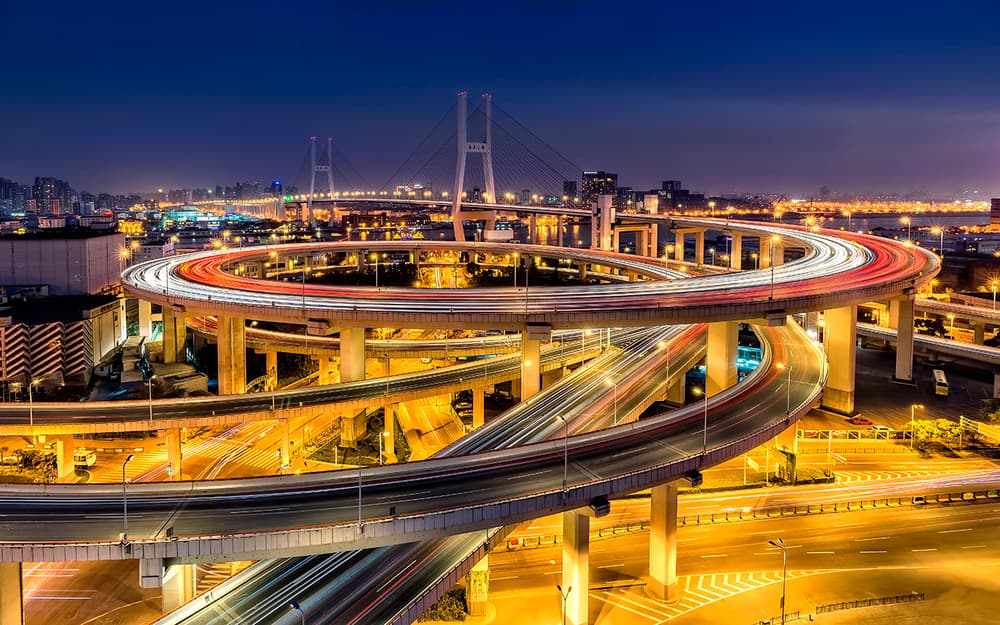 Urban Interchange Light Trails by Hua Zhu — canvas wall art