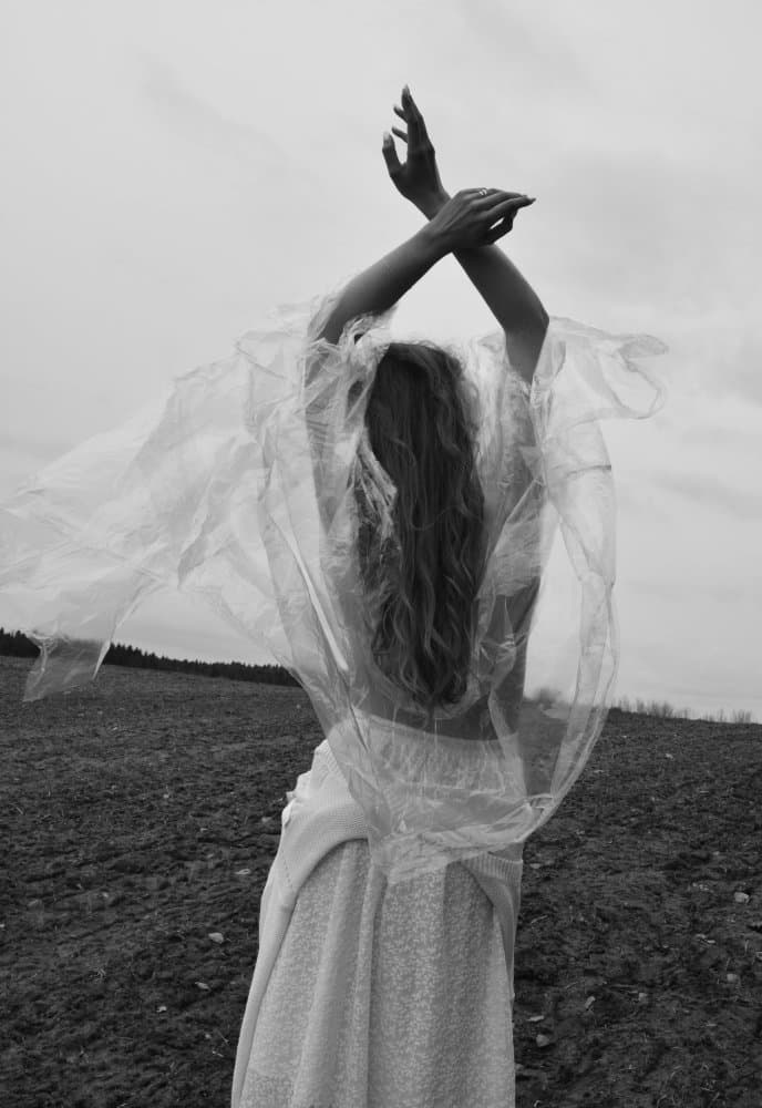 Topless girl in a transparent raincoat under the cold wind. by Alesia Mikhailova — canvas wall art