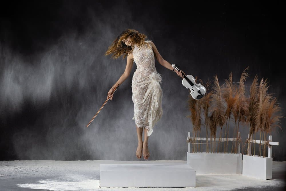 Floating Violinist in White by Lisdiyanto Suhardjo — canvas wall art