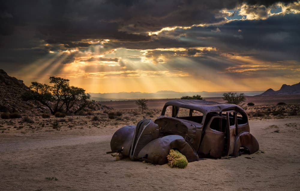 Vintage Car Sunset Rays by Anne Berger — canvas wall art