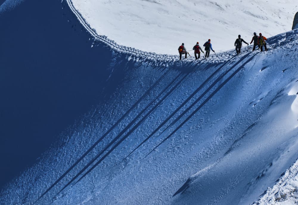 Mountaineers on Snowy Ridge by mihai ian nedelcu — canvas wall art