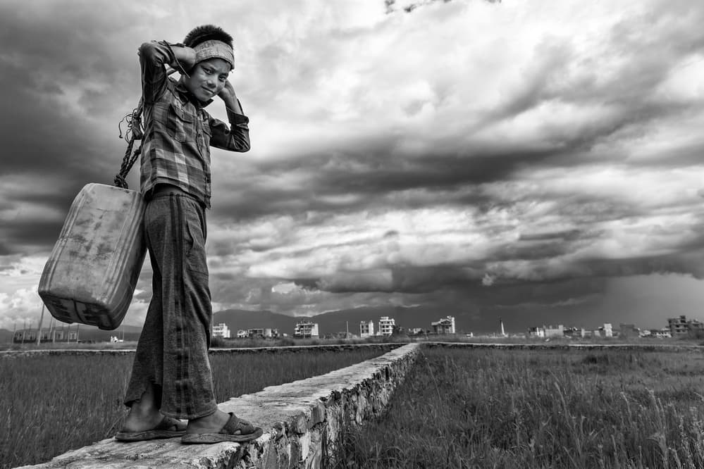 Young Water Carrier by Haitham AL Farsi — canvas wall art