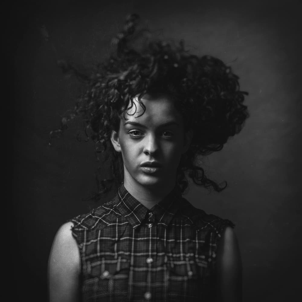 Moody Young Woman by Ewa Cwikla — canvas wall art