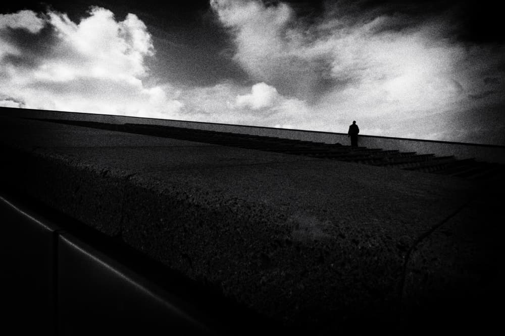 Solitary Climb Dramatic Sky by Paulo Abrantes — canvas wall art