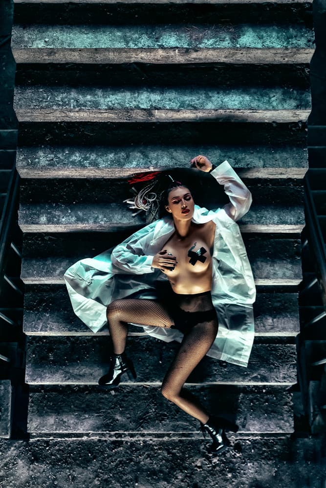 Woman on Dark Stairs by Ruslan Bolgov — canvas wall art