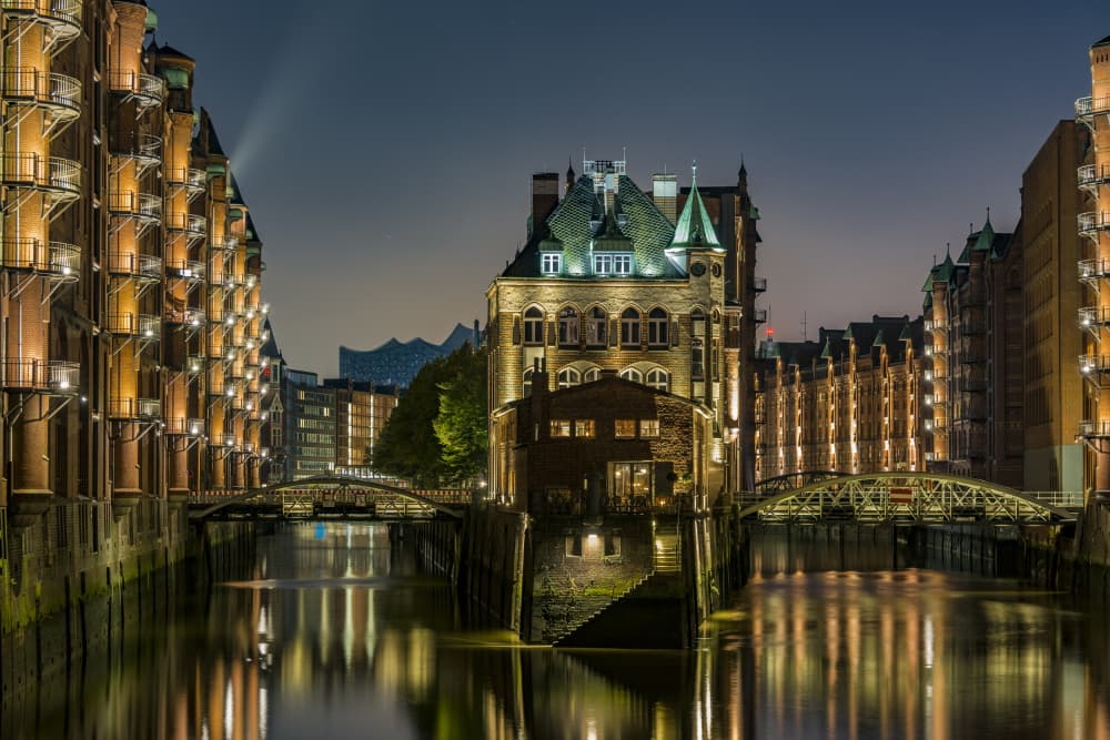 Illuminated Hamburg Speicherstadt by Jürgen Muß — canvas wall art