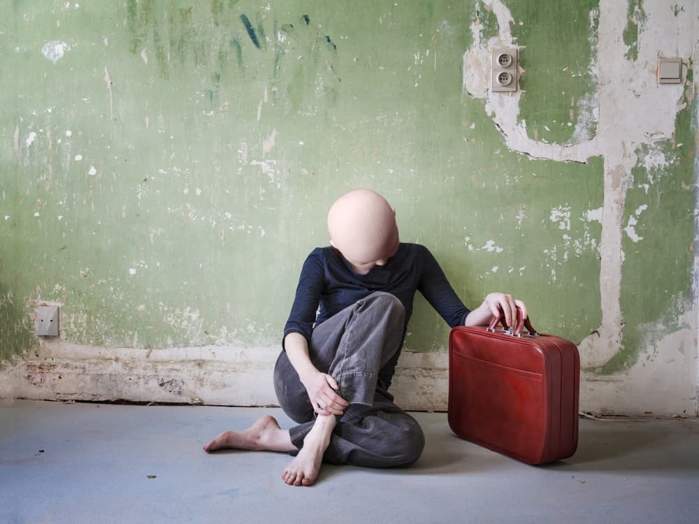 Silent Figure Red Suitcase by Ton Dirven — canvas wall art