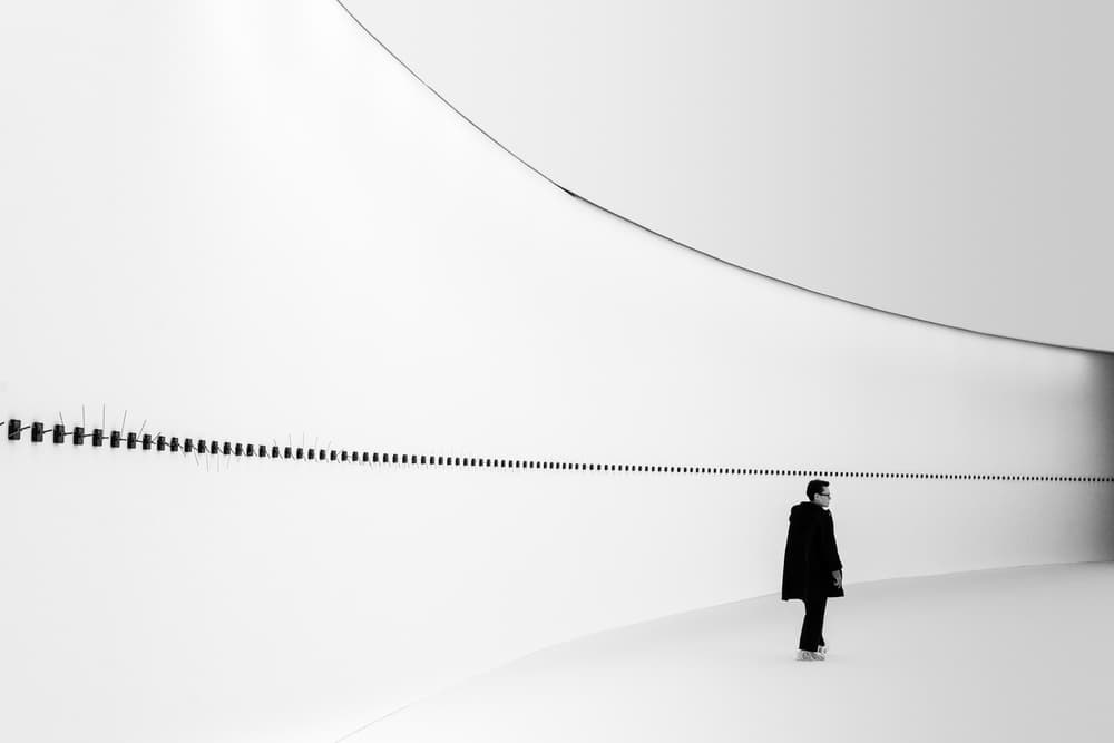 Solitary Man White Space by Luc Vangindertael (laGrange) — canvas wall art