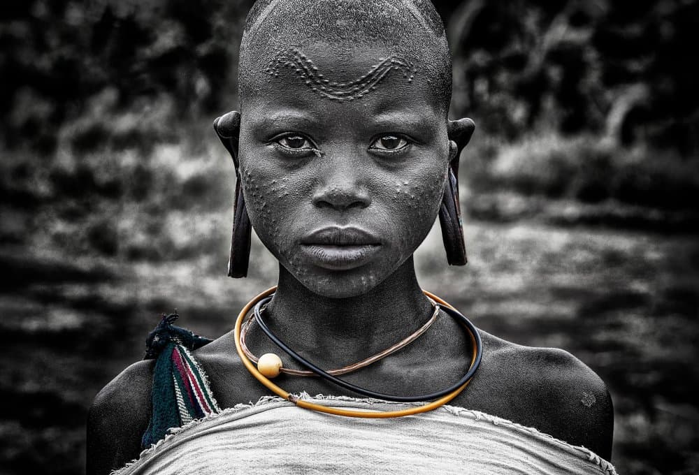 Tribal Child's Gaze by Joxe Inazio Kuesta Garmendia — canvas wall art