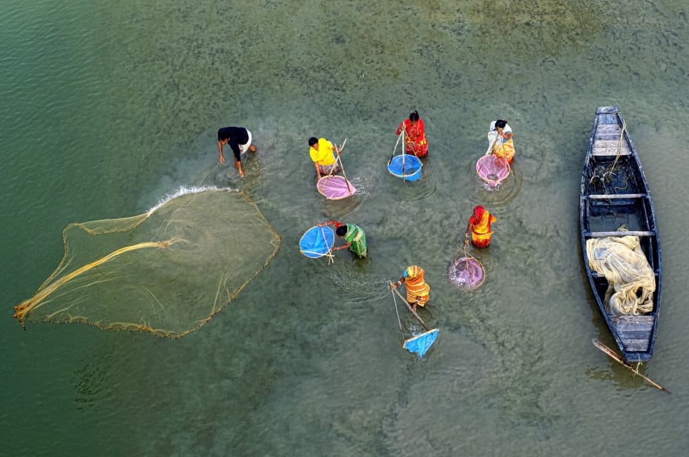 River Fishing with Nets by Ajit Kumar Majhi — canvas wall art