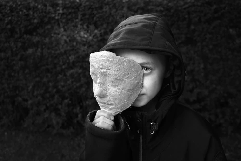 Child's Masked Gaze by Holger Goehler — canvas wall art