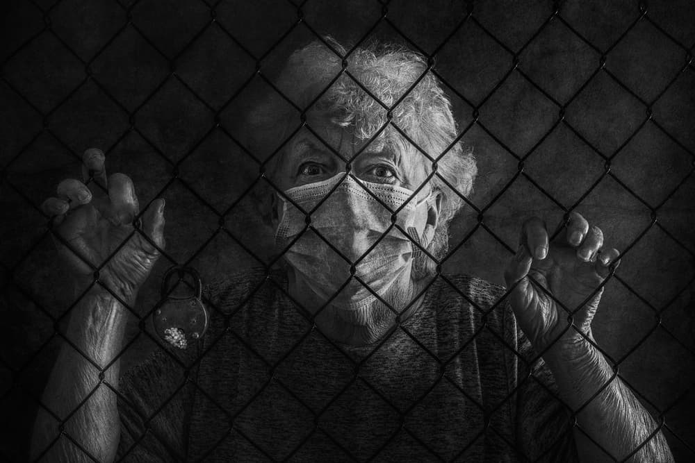 Elderly Woman Trapped Behind Fence by Stephen Clough — canvas wall art