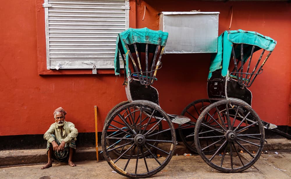 Old Man and Rickshaws by Md. Arifuzzaman — canvas wall art