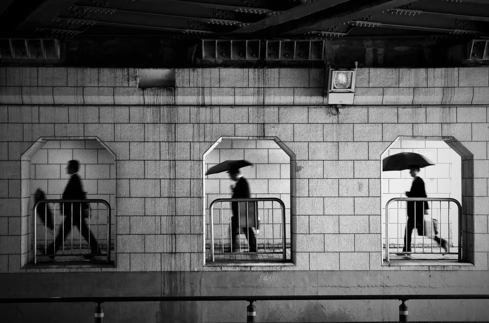 Urban Silhouettes In Motion by Reiko kiri — canvas wall art