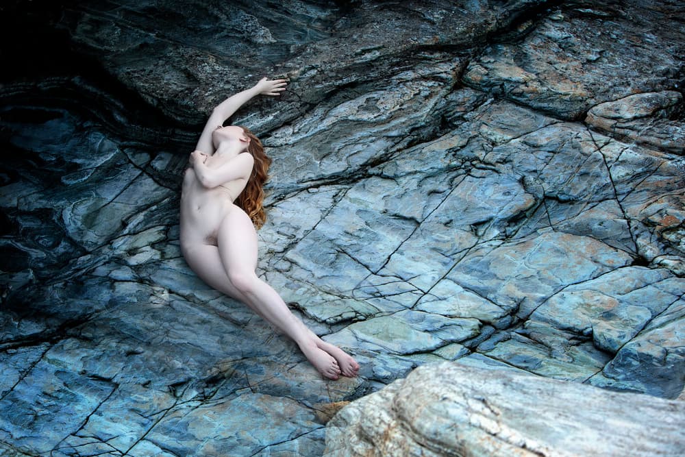Graceful Nude on Rocks by Hugh Wilkinson — canvas wall art