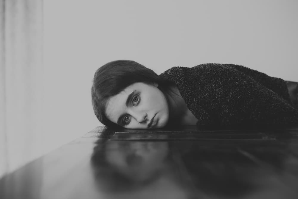 Pensive Young Woman by Małgorzata Masarz — canvas wall art