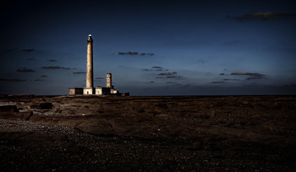 Lonely Lighthouse Coast by Eric Mattheyses — canvas wall art