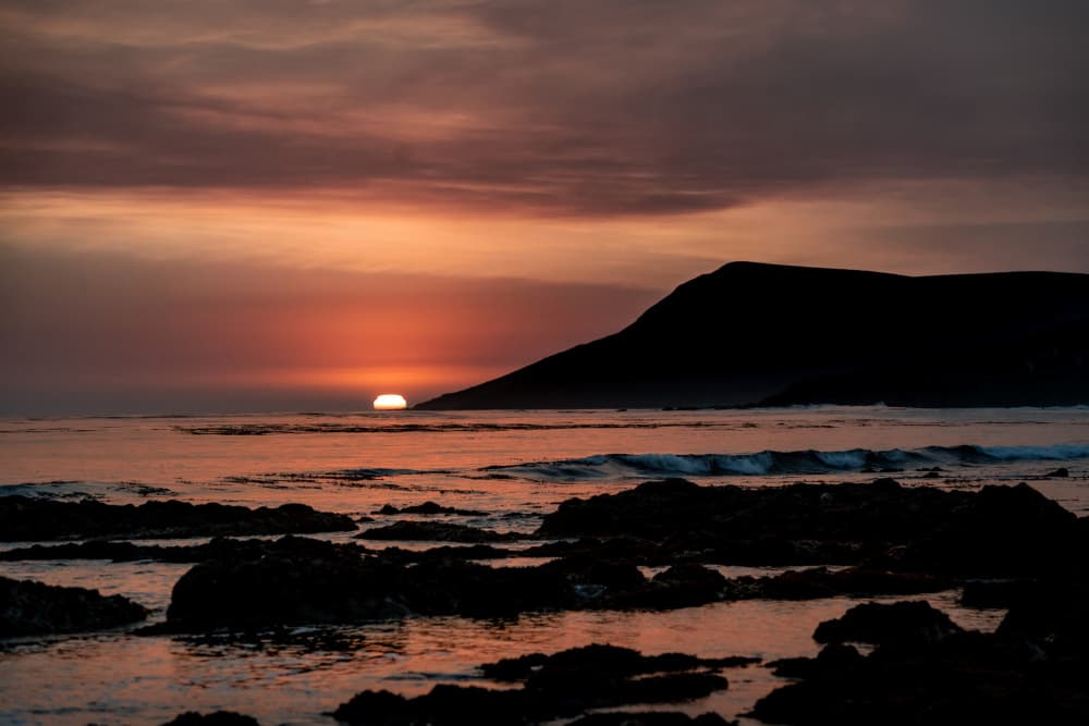 Dramatic Ocean Sunset by Tim Mossholder — canvas wall art