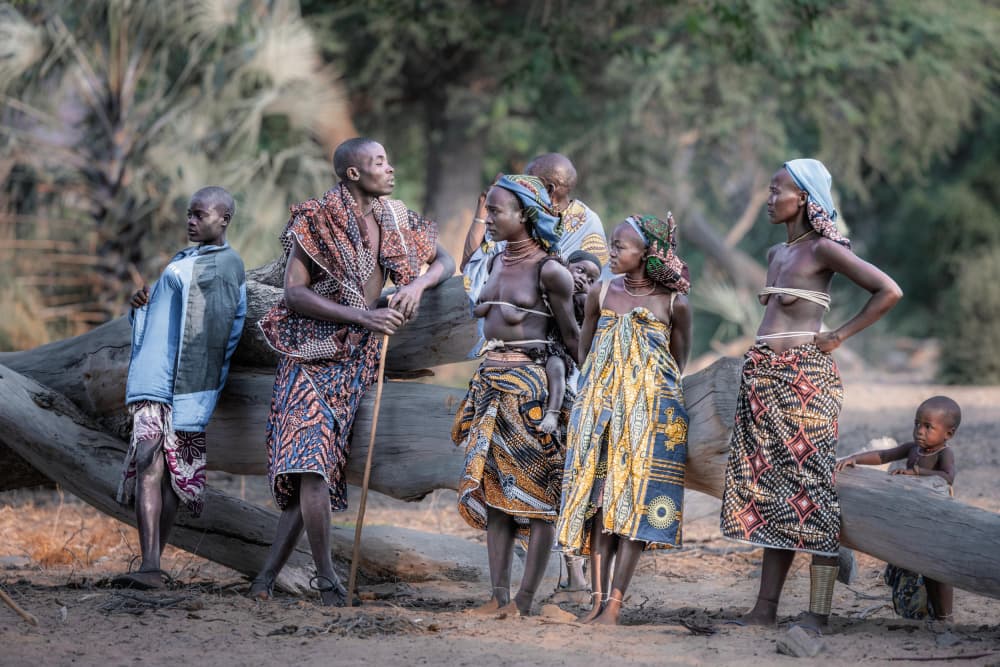 African Village Gathering by Trevor Cole — canvas wall art