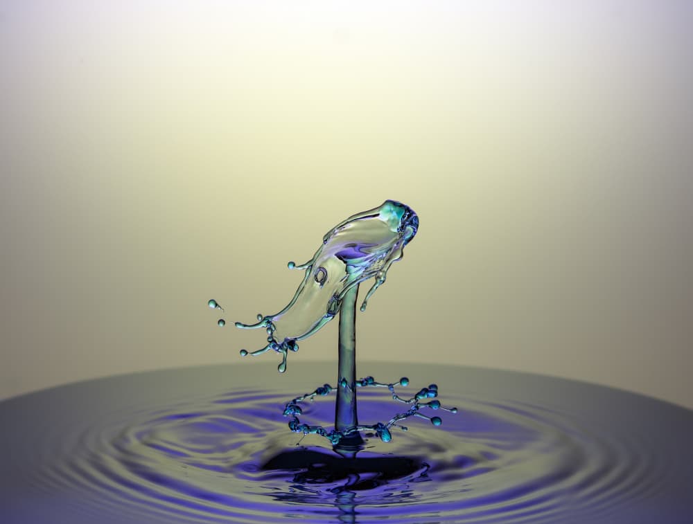 Vibrant Liquid Collision by Yousef Sayadi — canvas wall art