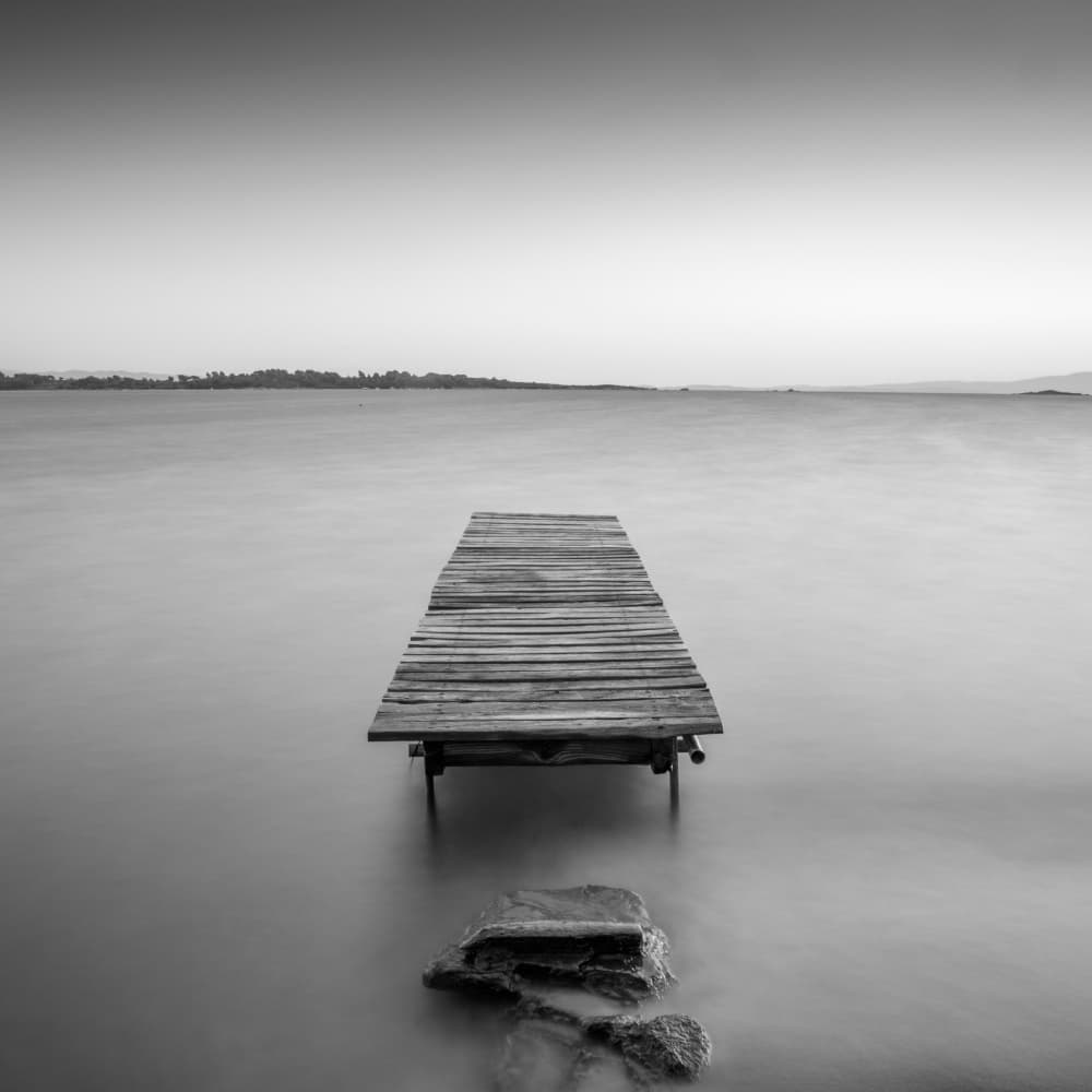 Peaceful Wooden Pier by Catalin Baican — canvas wall art