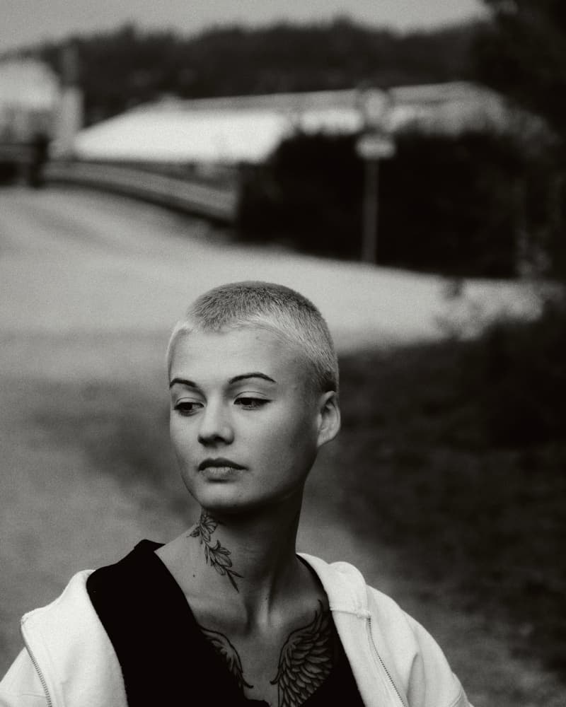 Pensive Buzzcut Woman by Steffen Lauterbach — canvas wall art