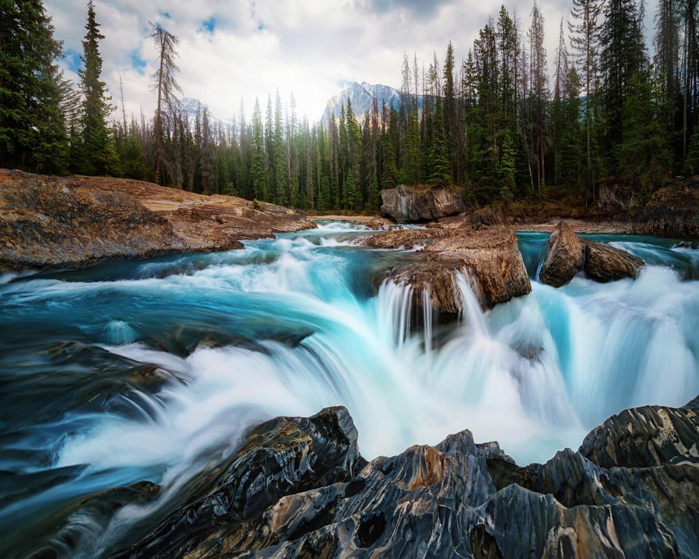 Turquoise River Falls by Juan Pablo de Miguel — canvas wall art