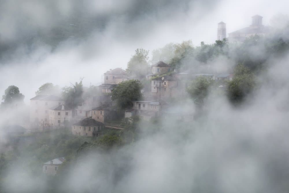 Misty Mountain Village by Chris Vasiliadis — canvas wall art