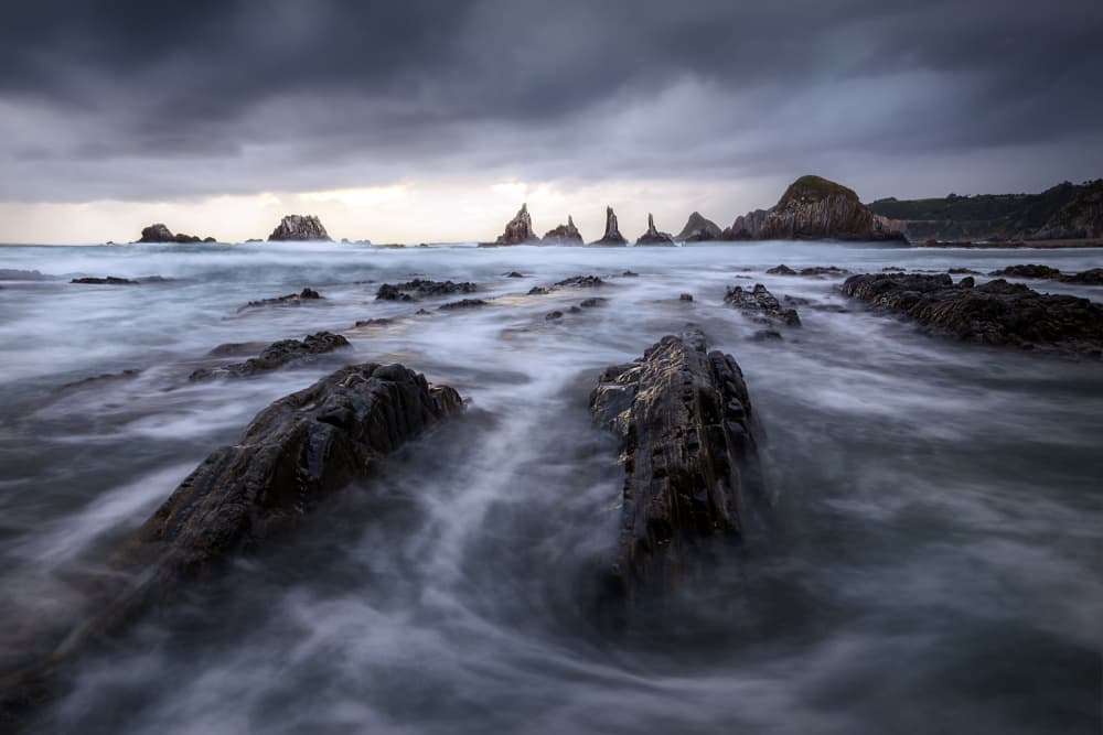 Dramatic Sea Stacks by Rodrigo Núñez Buj — canvas wall art